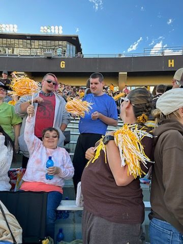 A Group of People are Having Fun Inside the Stadium — Cheyenne, WY — Treasure Abilities