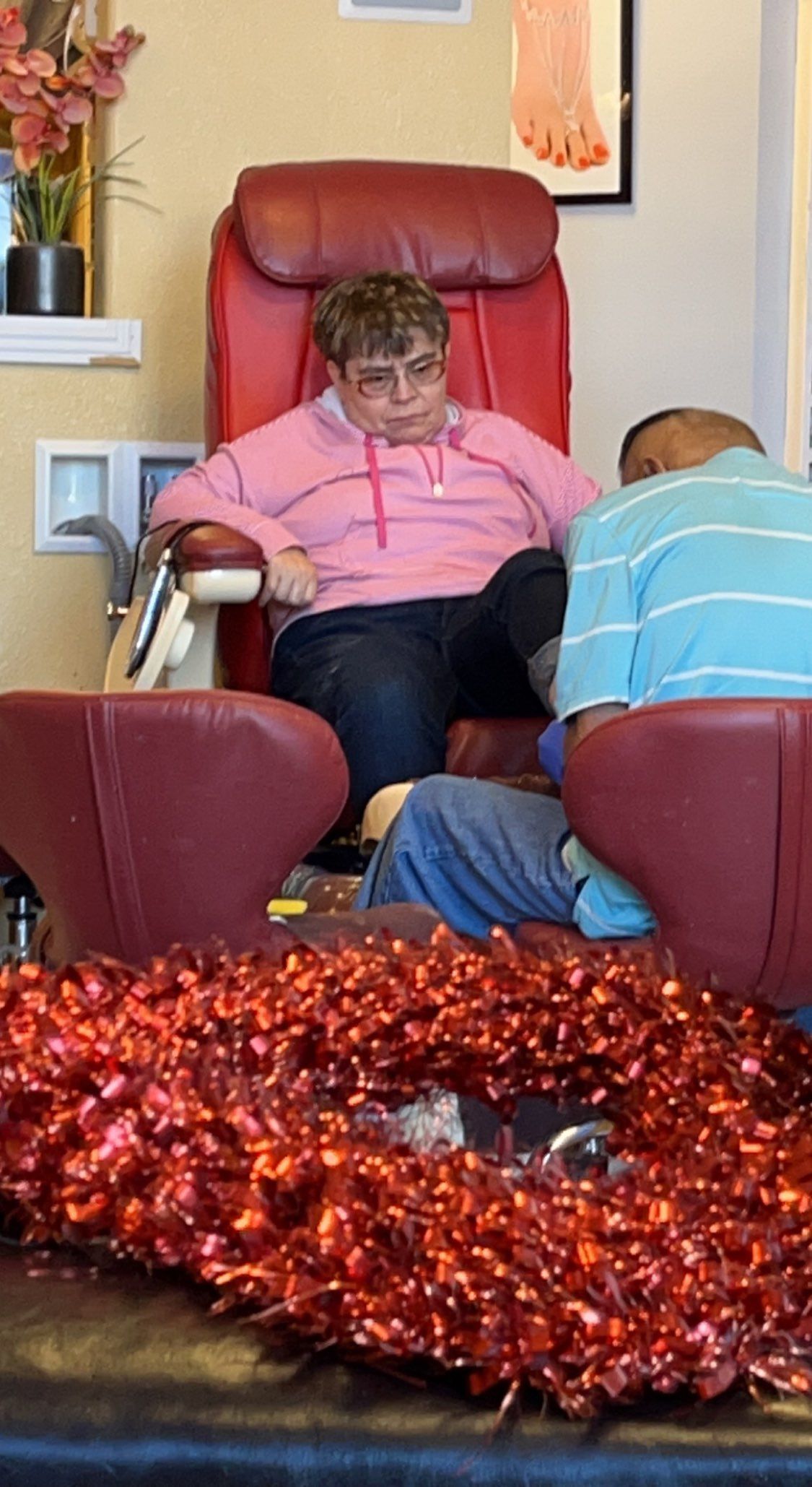 Woman with Down Syndrome Having a Foot Spa — Cheyenne, WY — Treasure Abilities