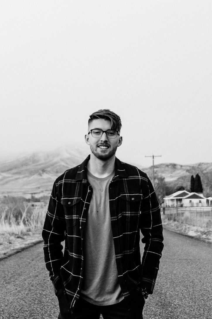 man with glasses smiling