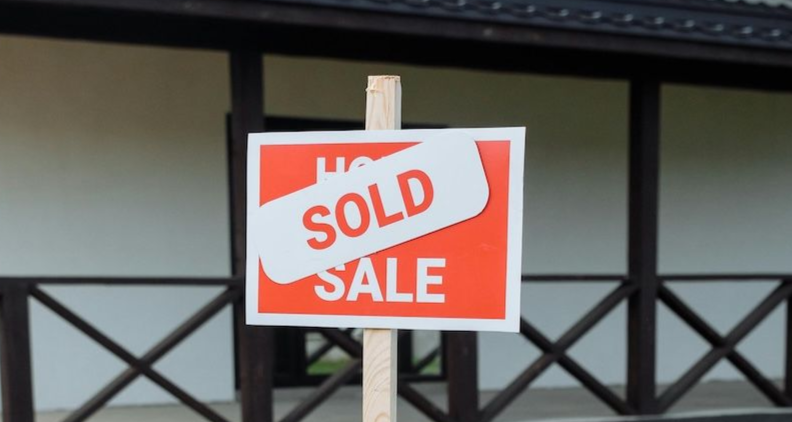 home for sale sign