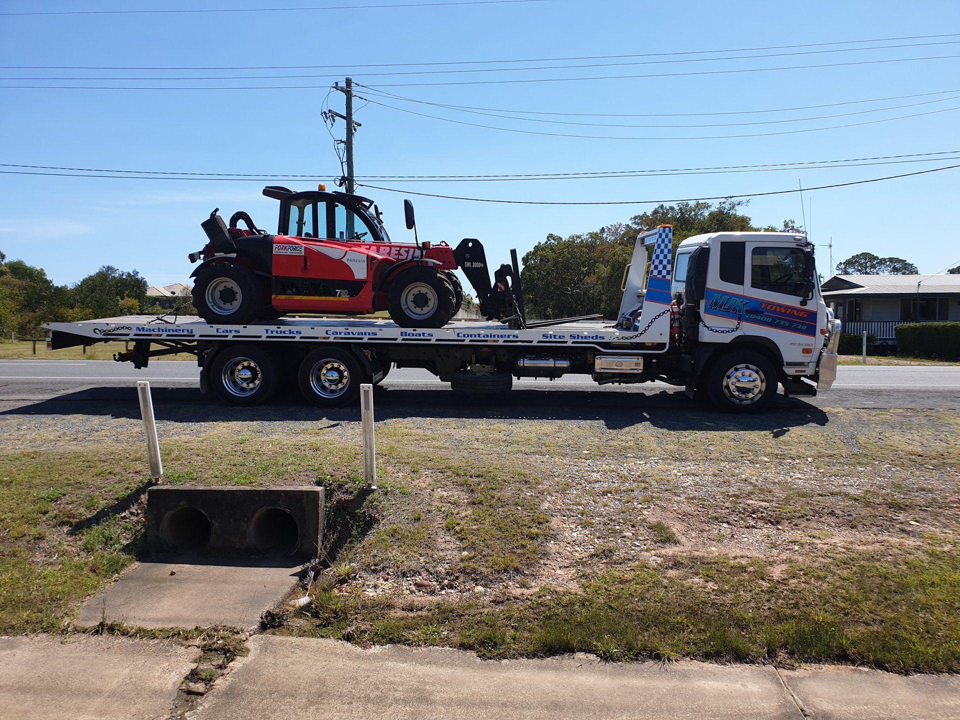 Heavy Machine — River Heads, QLD — MJK Towing