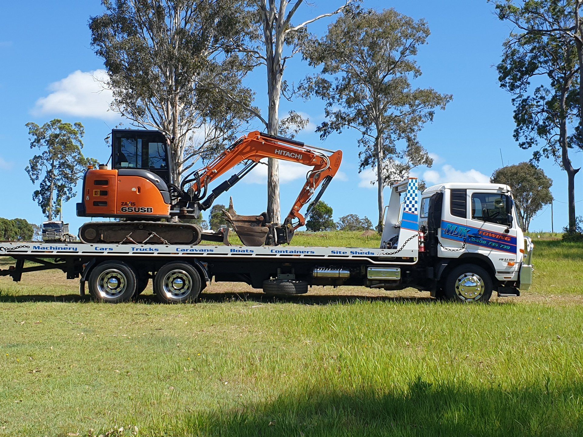 Excavator Machine Towing — Hervey Bay, QLD — MJK Towing