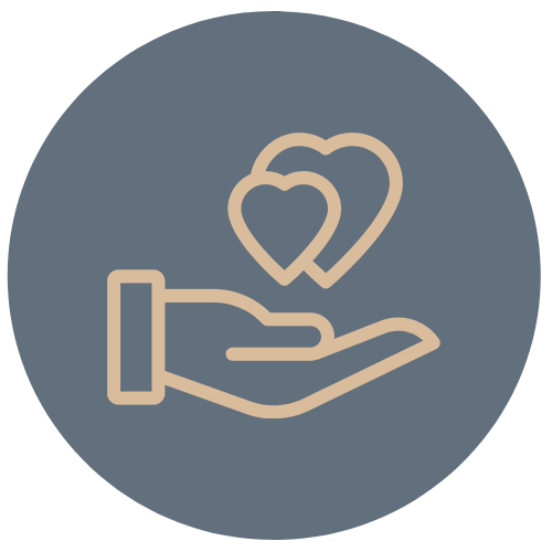 a hand holding two hearts in a circle .