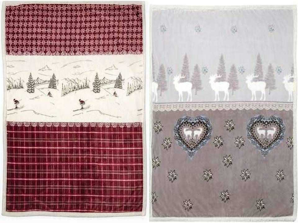 Due coperte con cervi e alberi sopra
