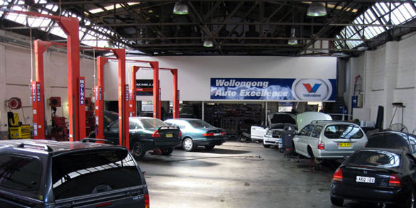 An Inside of a Mechanic's Garage with Cars — Wollongong Auto Excellence In Wollongong, NSW
