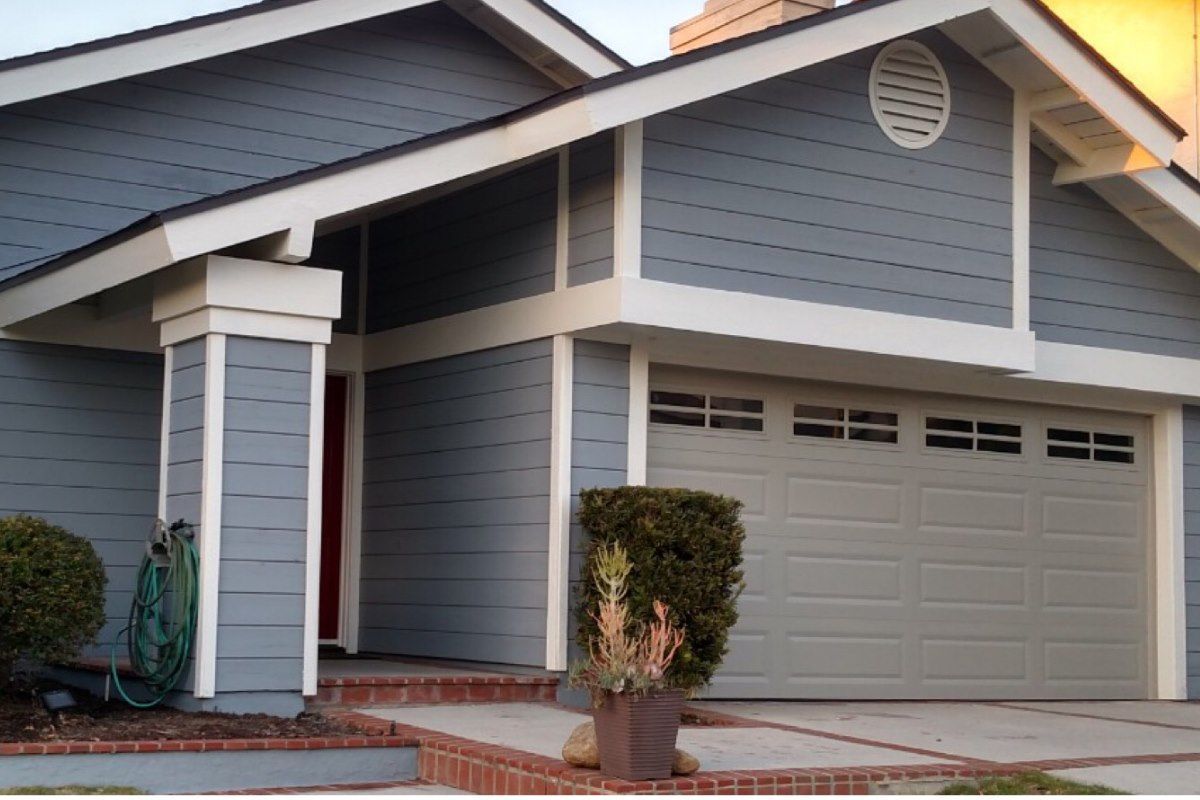 The front of a house with a garage door