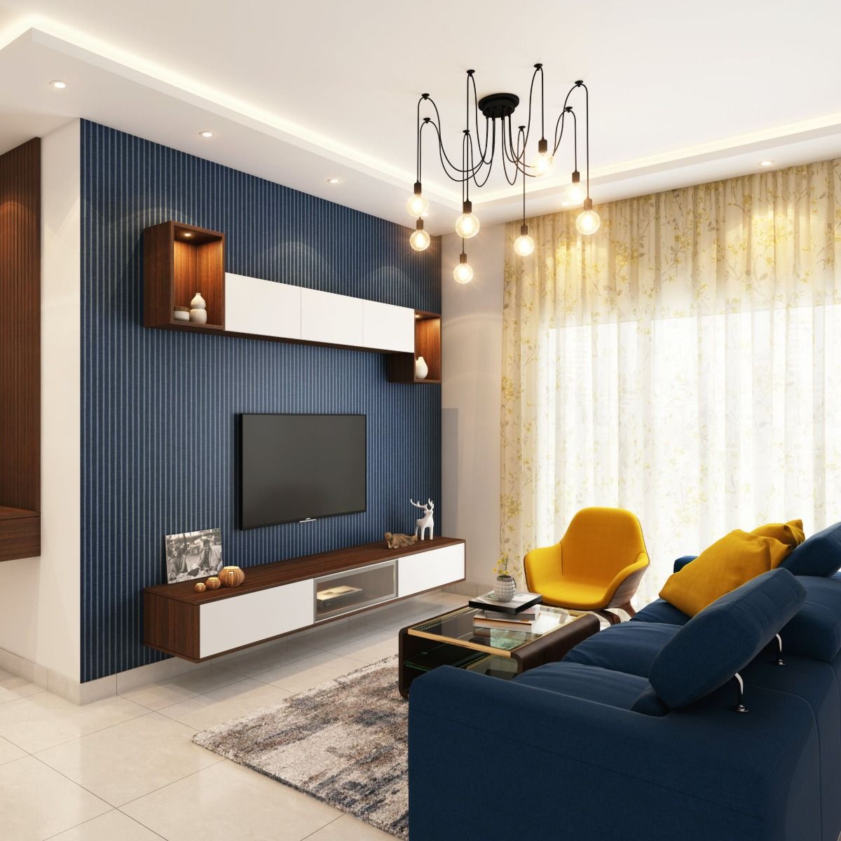 A living room with a blue couch and yellow chairs
