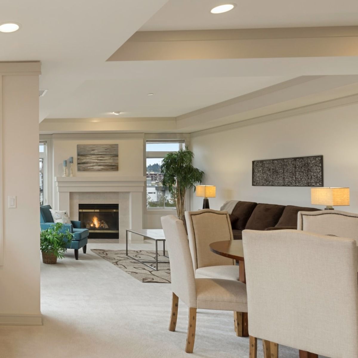 A living room filled with furniture and a fireplace