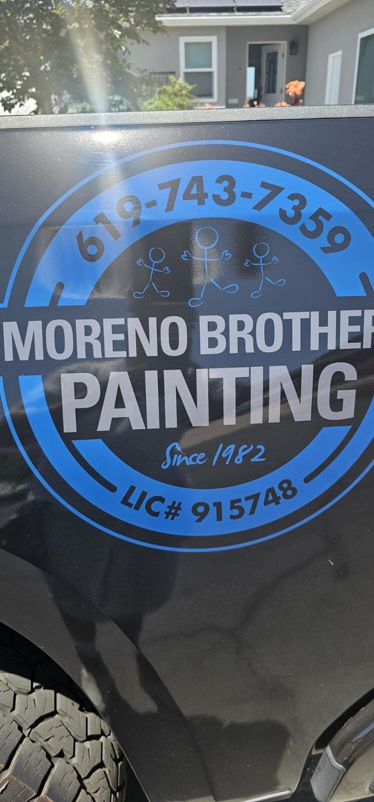 The logo for moreno brother painting is on the side of a truck