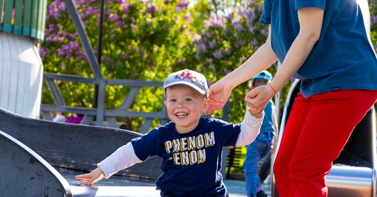 Little boy smiling, playing in the park