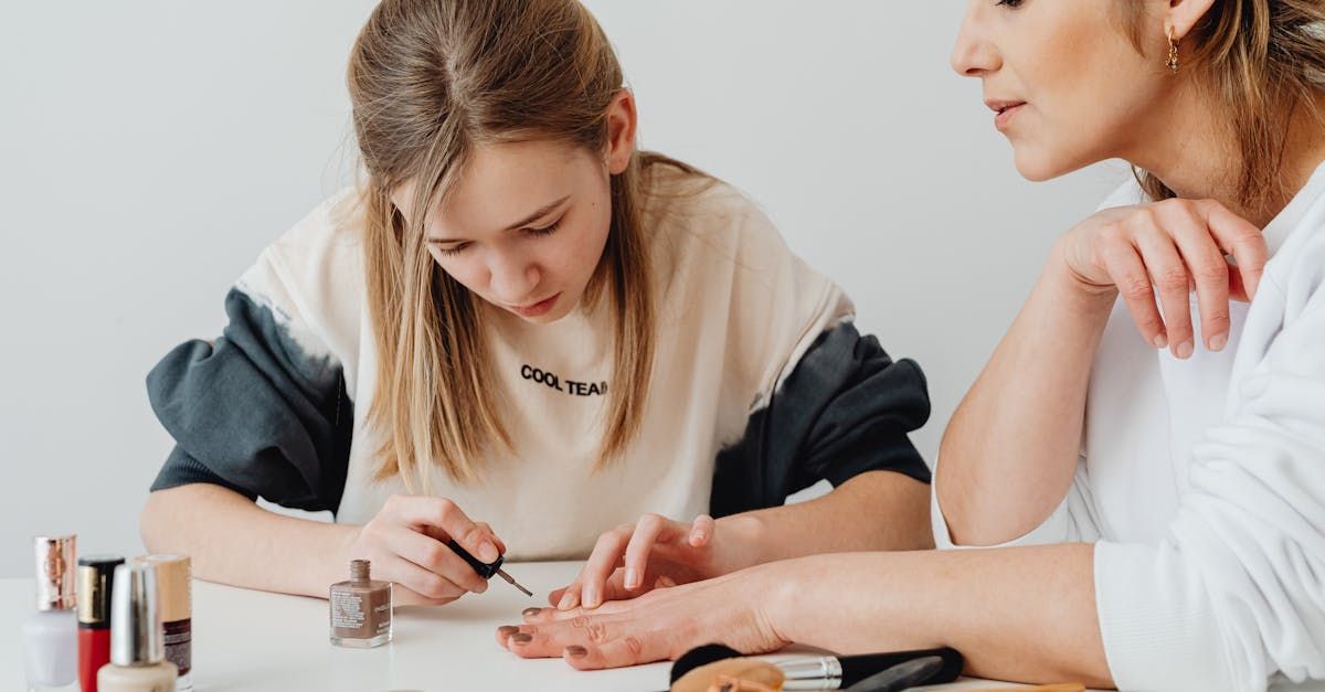 Lady having her nails painted