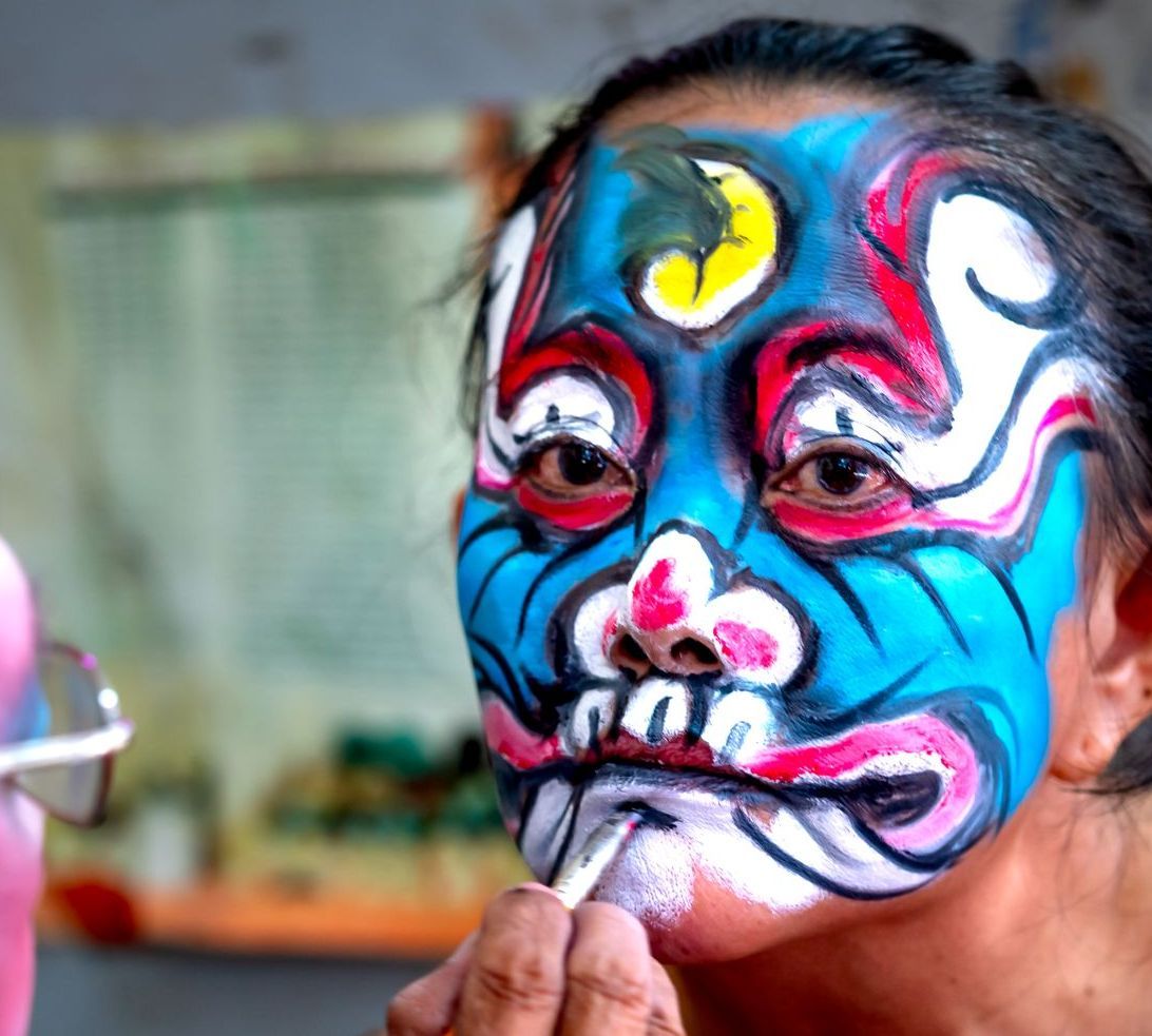 different elements of nature painted on face
