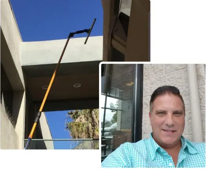 Long pole with squeegee cleaning a building overhang, alongside a man smiling in a selfie.