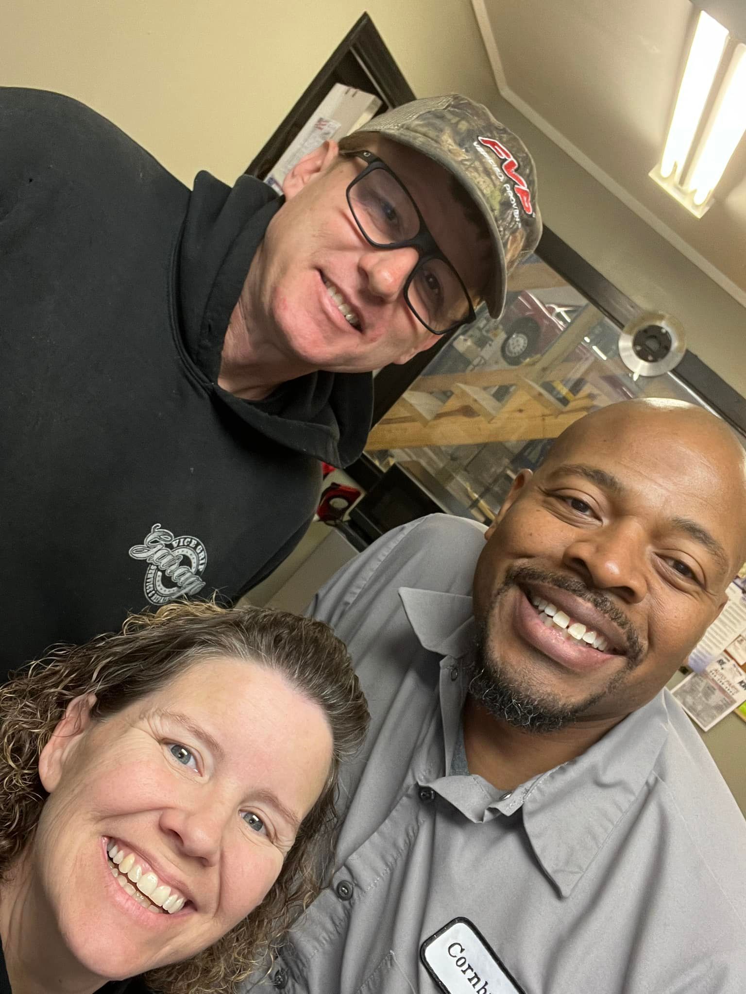 A Mechanic Is Working On the Underside of a Car on a Lift | FS Automotive