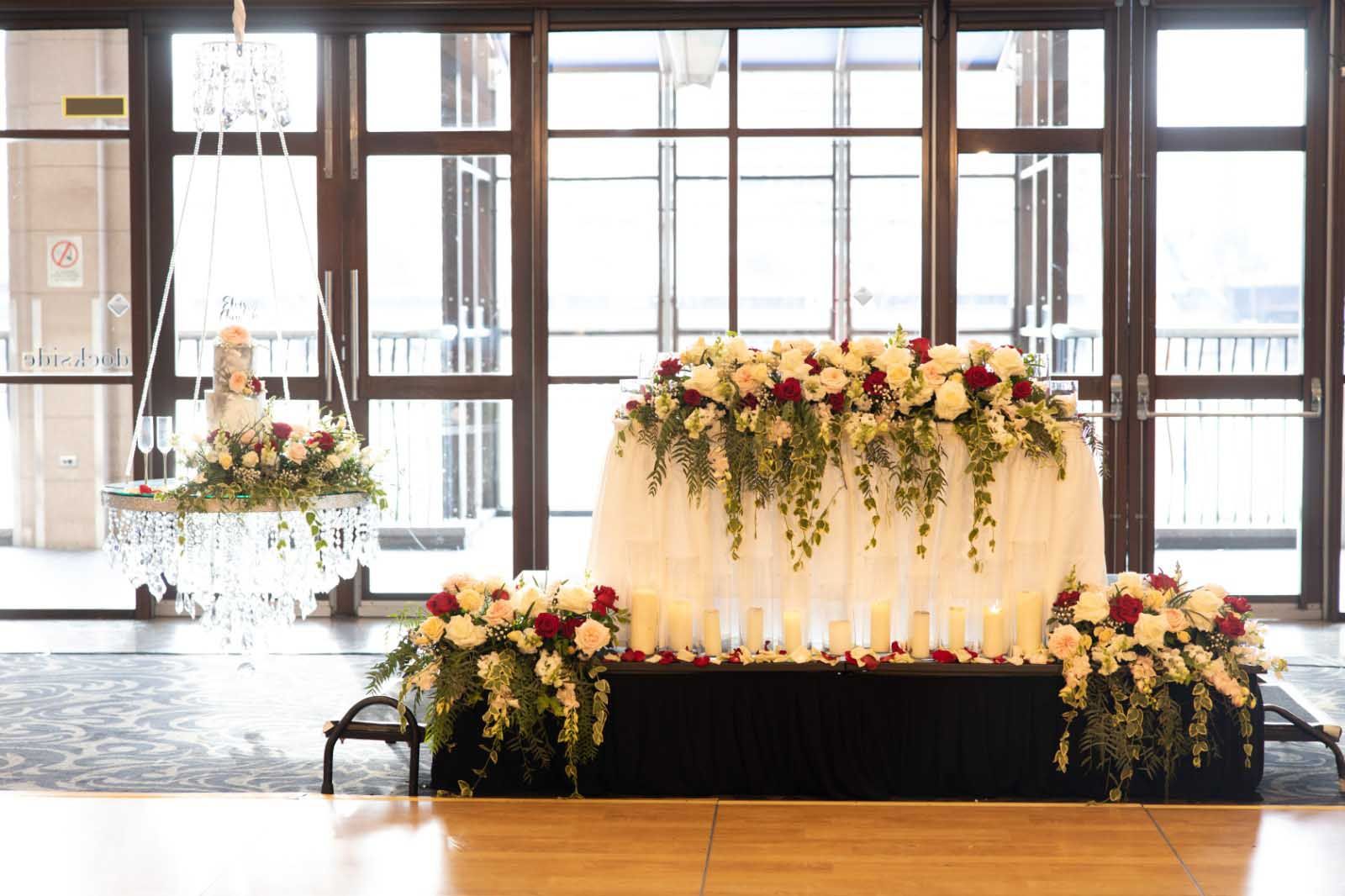 Bridal Table with White and Red Flowers — Sydney, NSW — Affordable Chair Covers & Candelabras