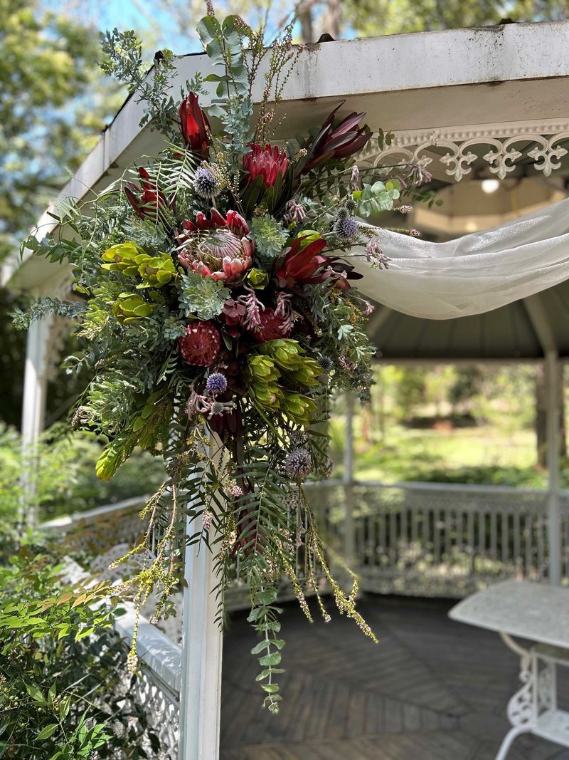 Gazebo with Hanging Flowers — Sydney, NSW — Affordable Chair Covers & Candelabras