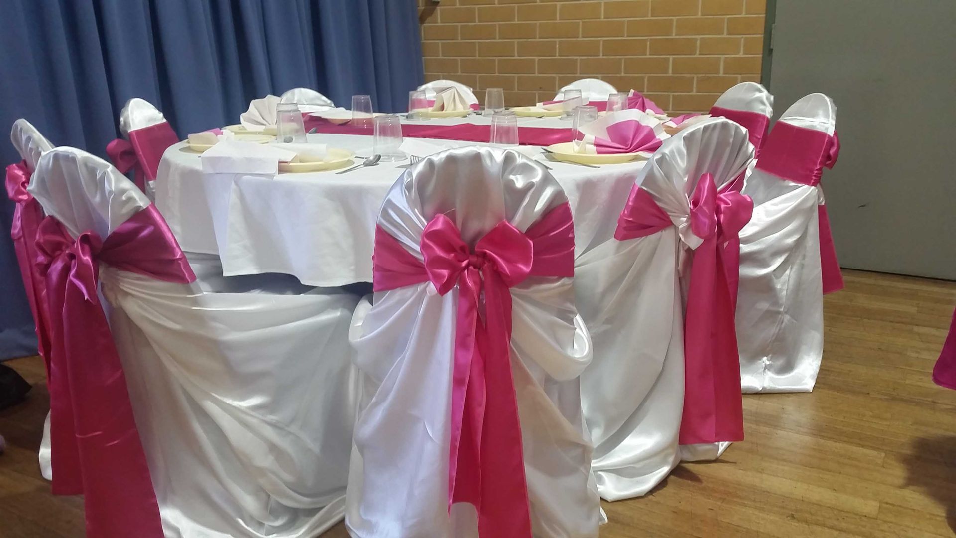Pink Elegant Tie Back Chairs — Sydney, NSW — Affordable Chair Covers & Candelabras
