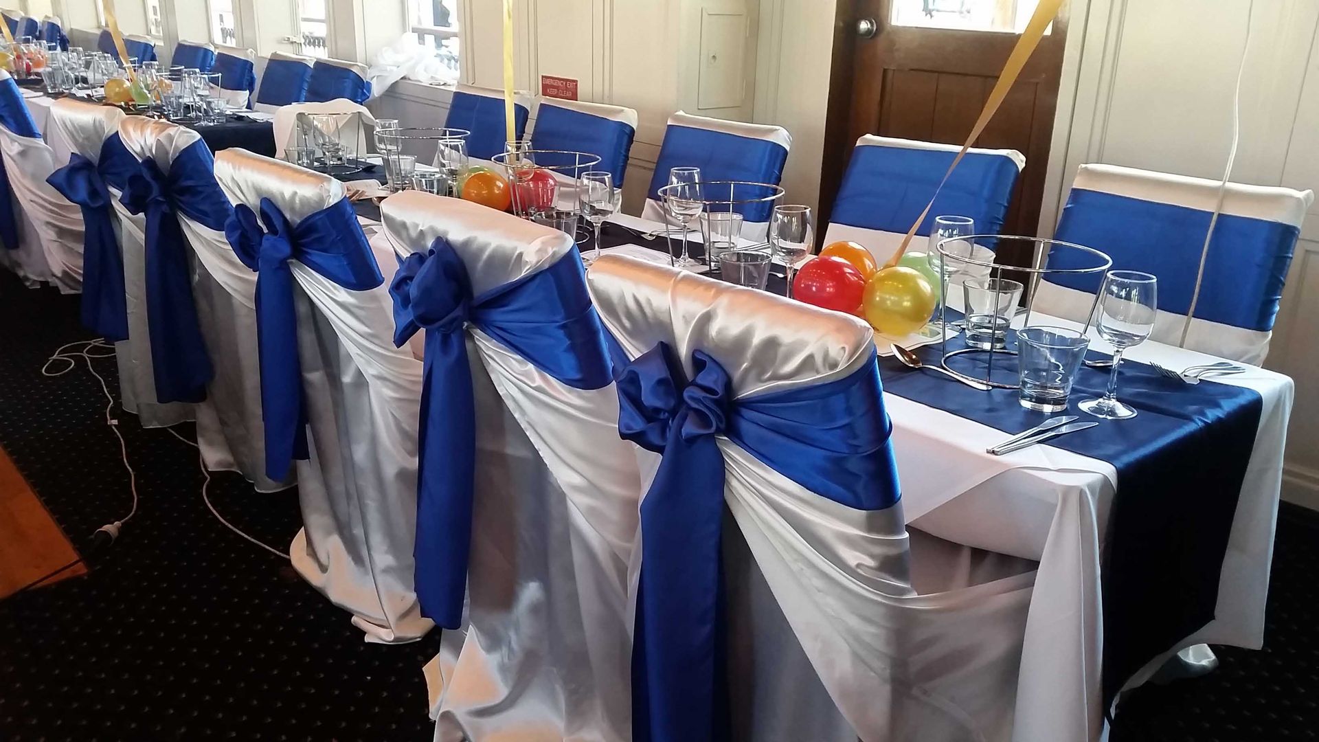 Blue Elegant Tie Back Chairs — Sydney, NSW — Affordable Chair Covers & Candelabras