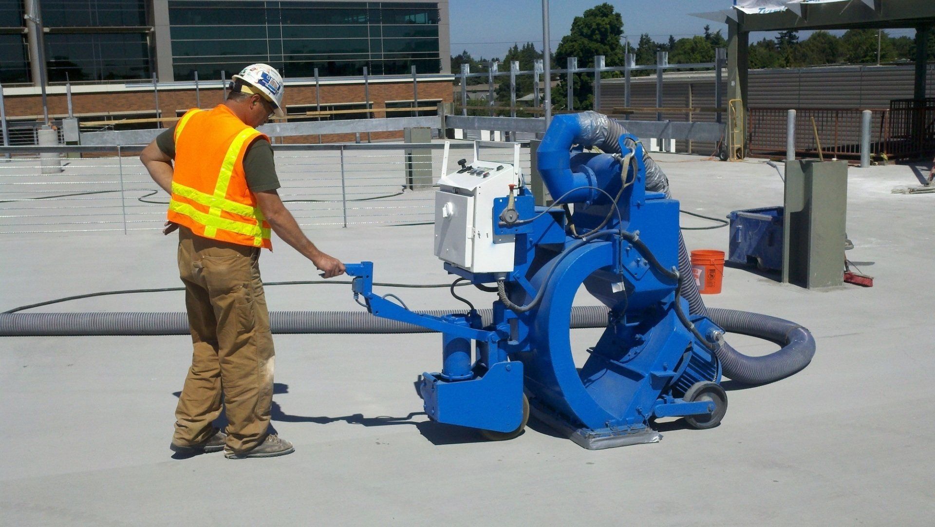 worker using a shotblasting machine in Oregon City, OR