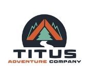 The logo for the titus adventure company has a mountain and a tree in it.