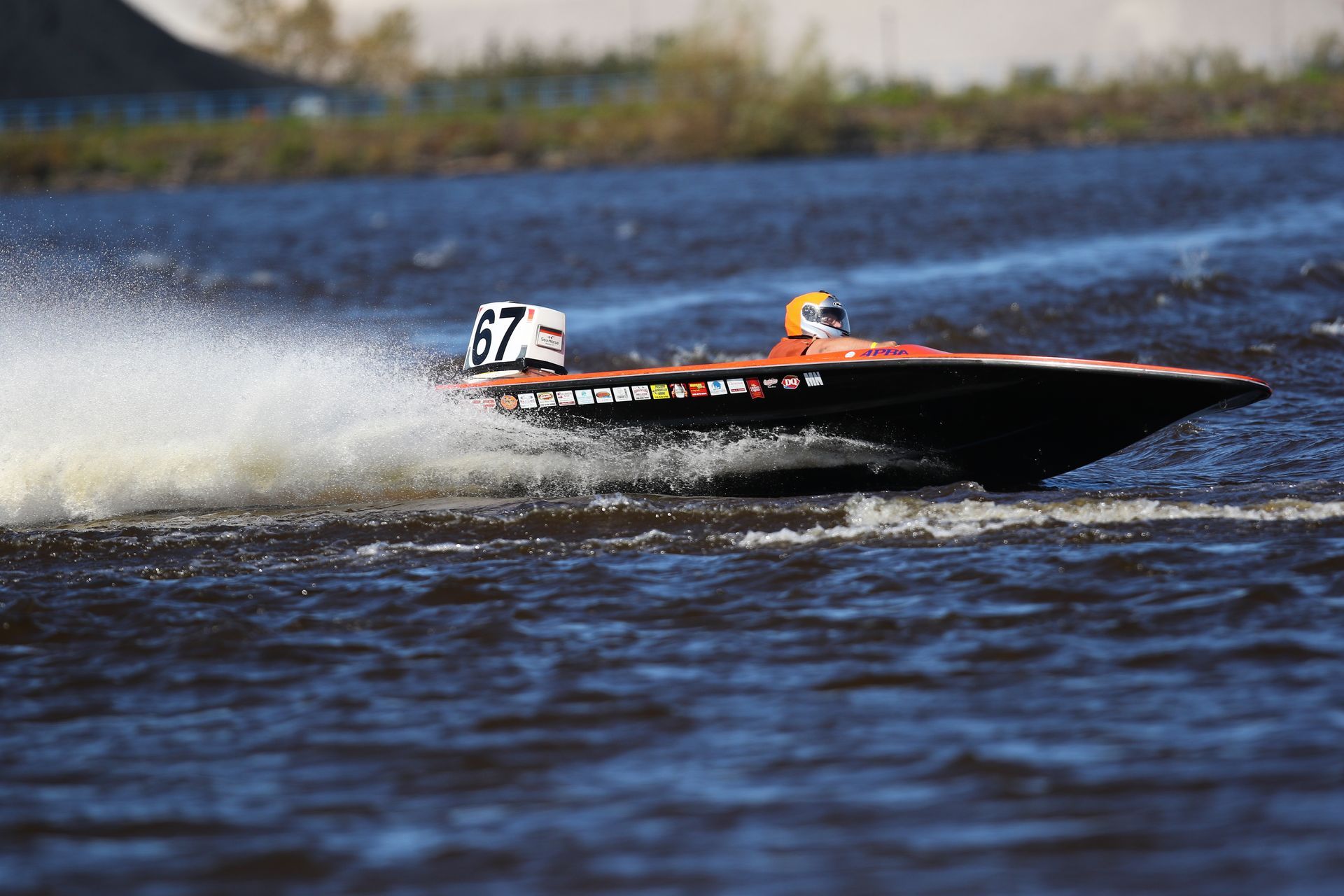 A boat with the number 87 on the side of it