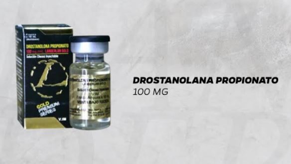 Vial y caja de Drostanolana Propionato 100 MG, frasco dorado y negro con etiqueta negra.