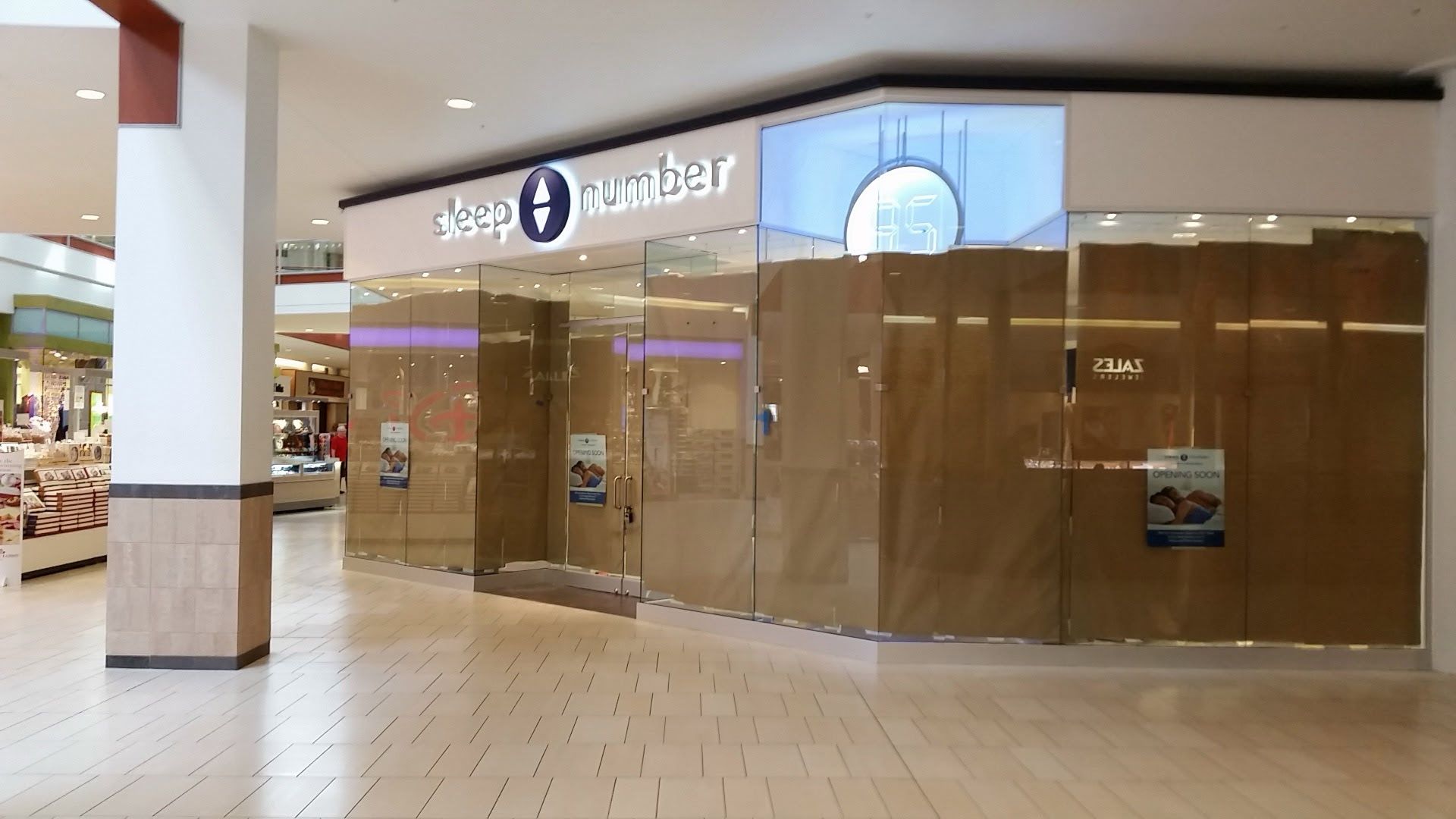 Barnes & Noble bookstore exterior with delivery truck parked in front on a sunny day.