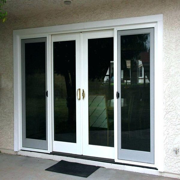 Exterior view of a wooden building with glass railing, partly reflecting the sky.