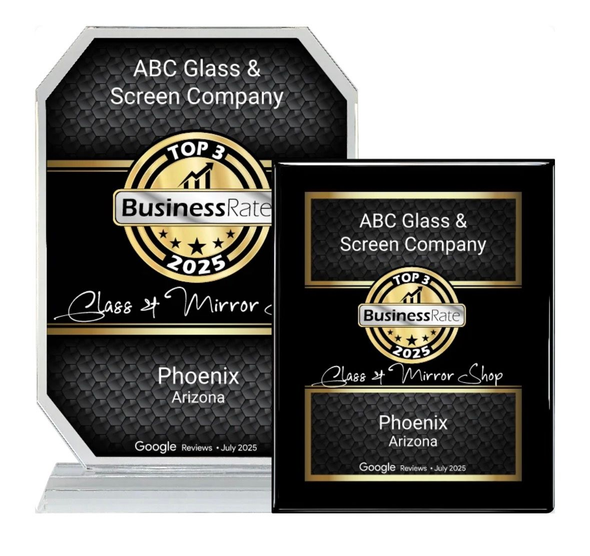 Gold and black pin celebrating 50 years of service. Text: