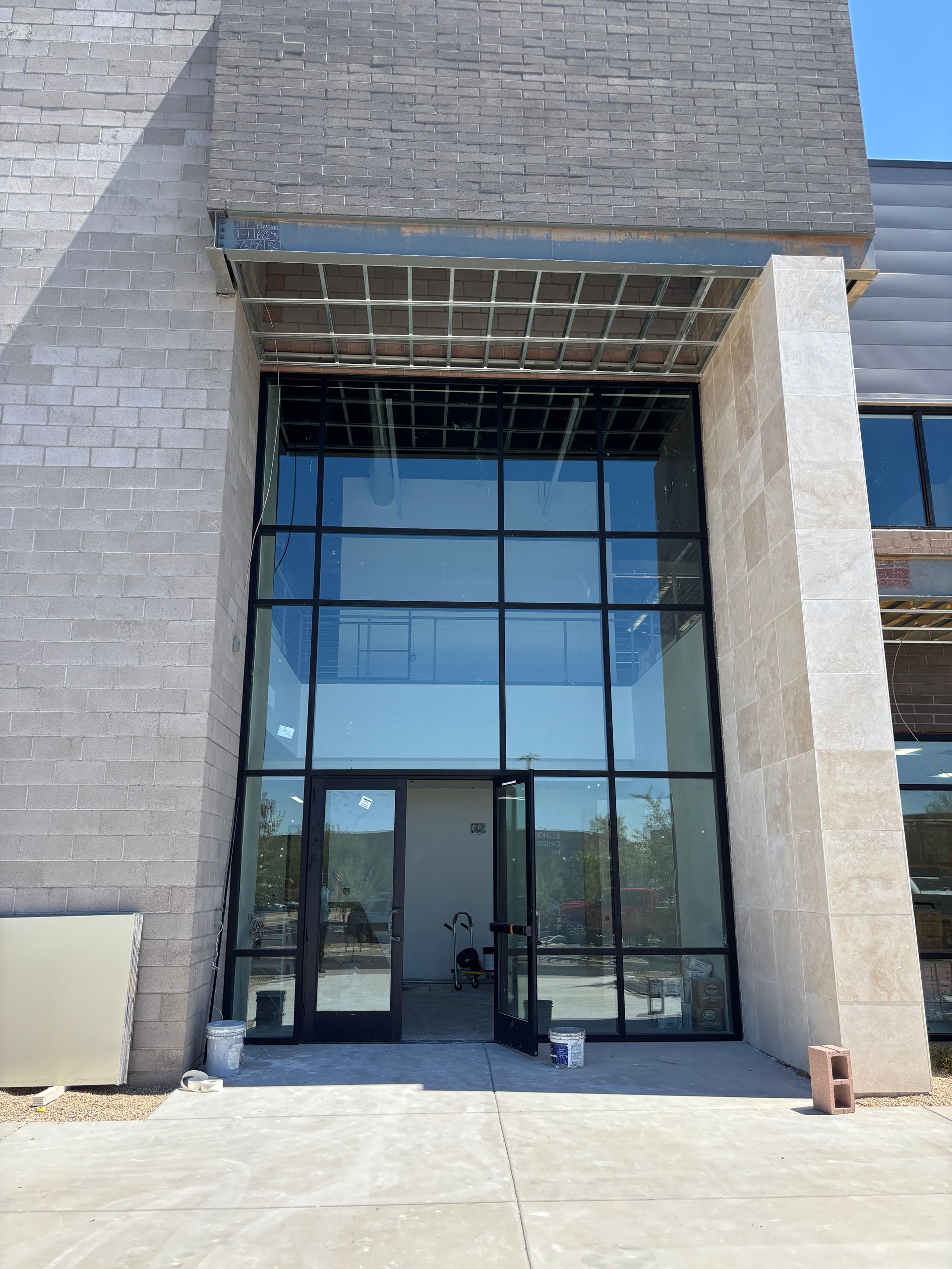 Barnes & Noble bookstore exterior with delivery truck parked in front on a sunny day.