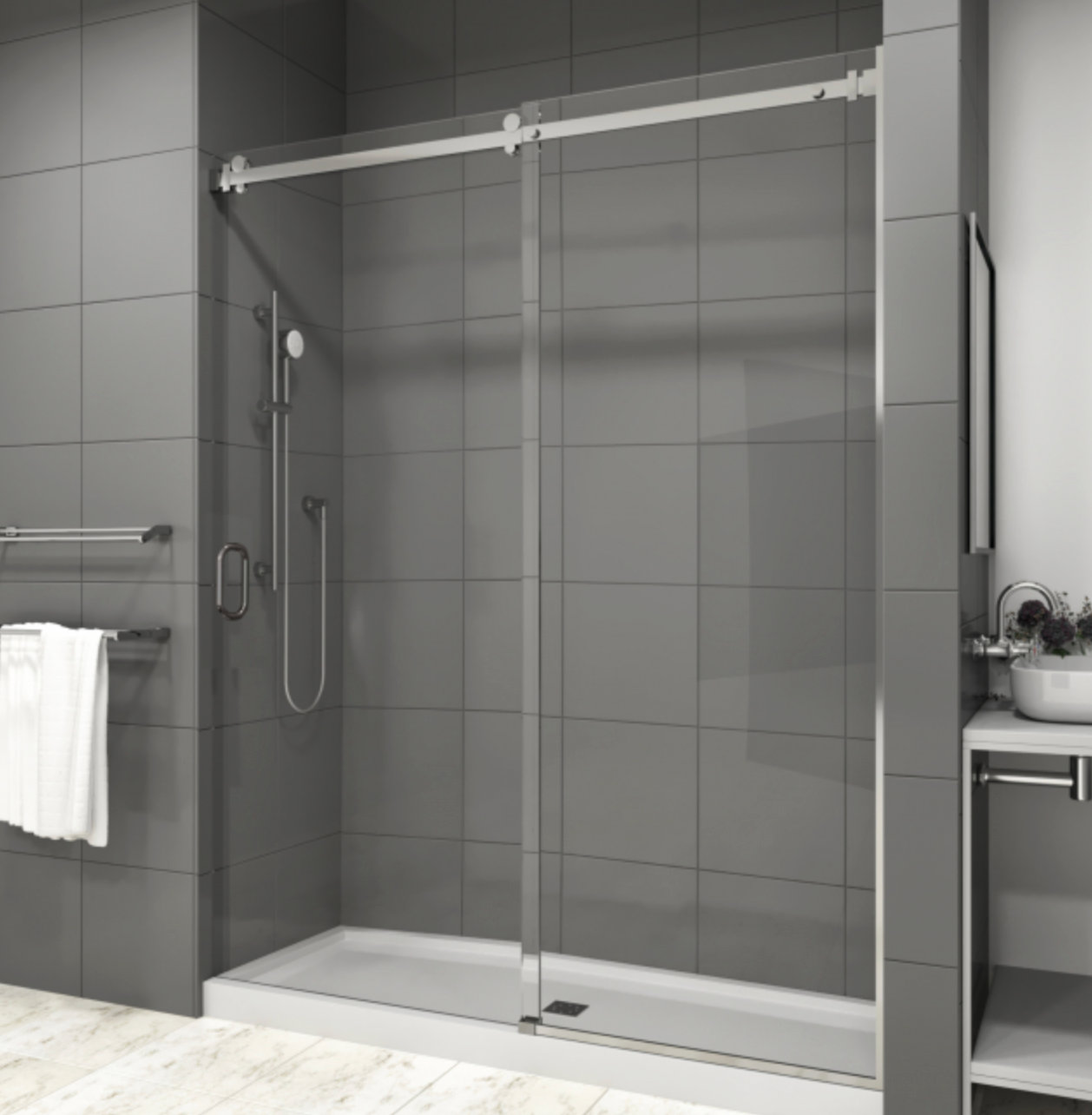 Glass shower with sliding door, gray tiled walls, and white shower base.