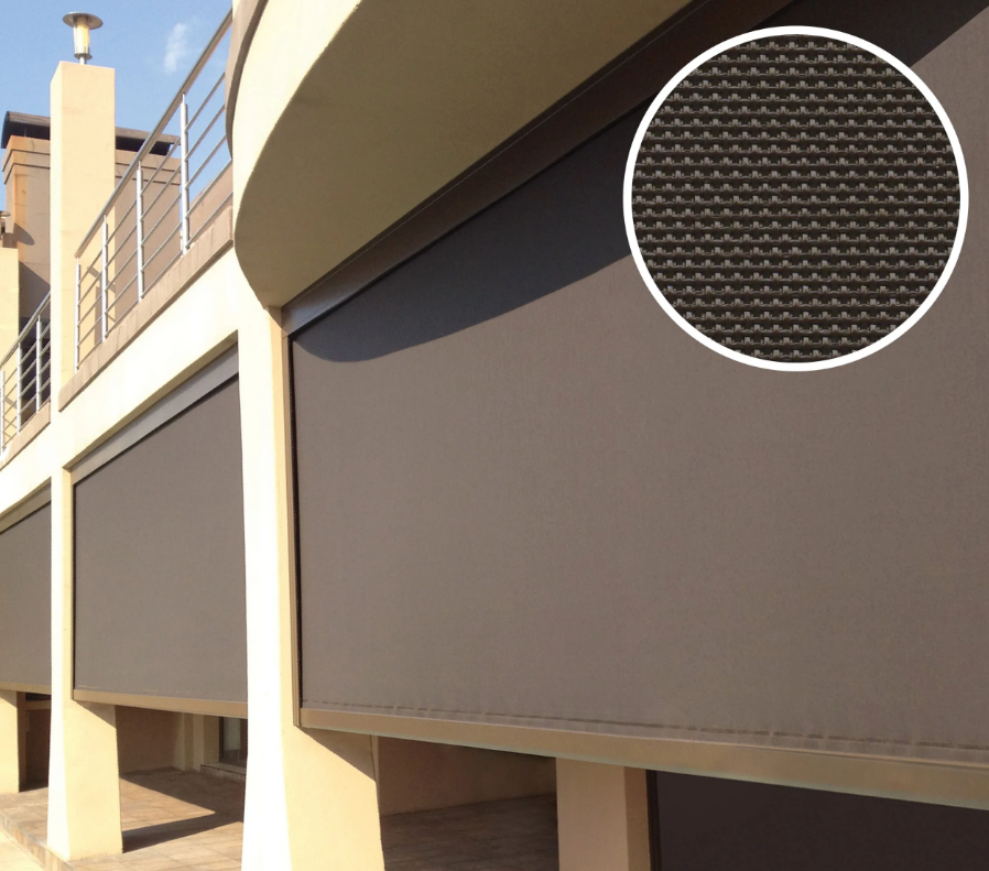 Outdoor patio with dark brown roller shades, close-up of shade fabric with a woven pattern.