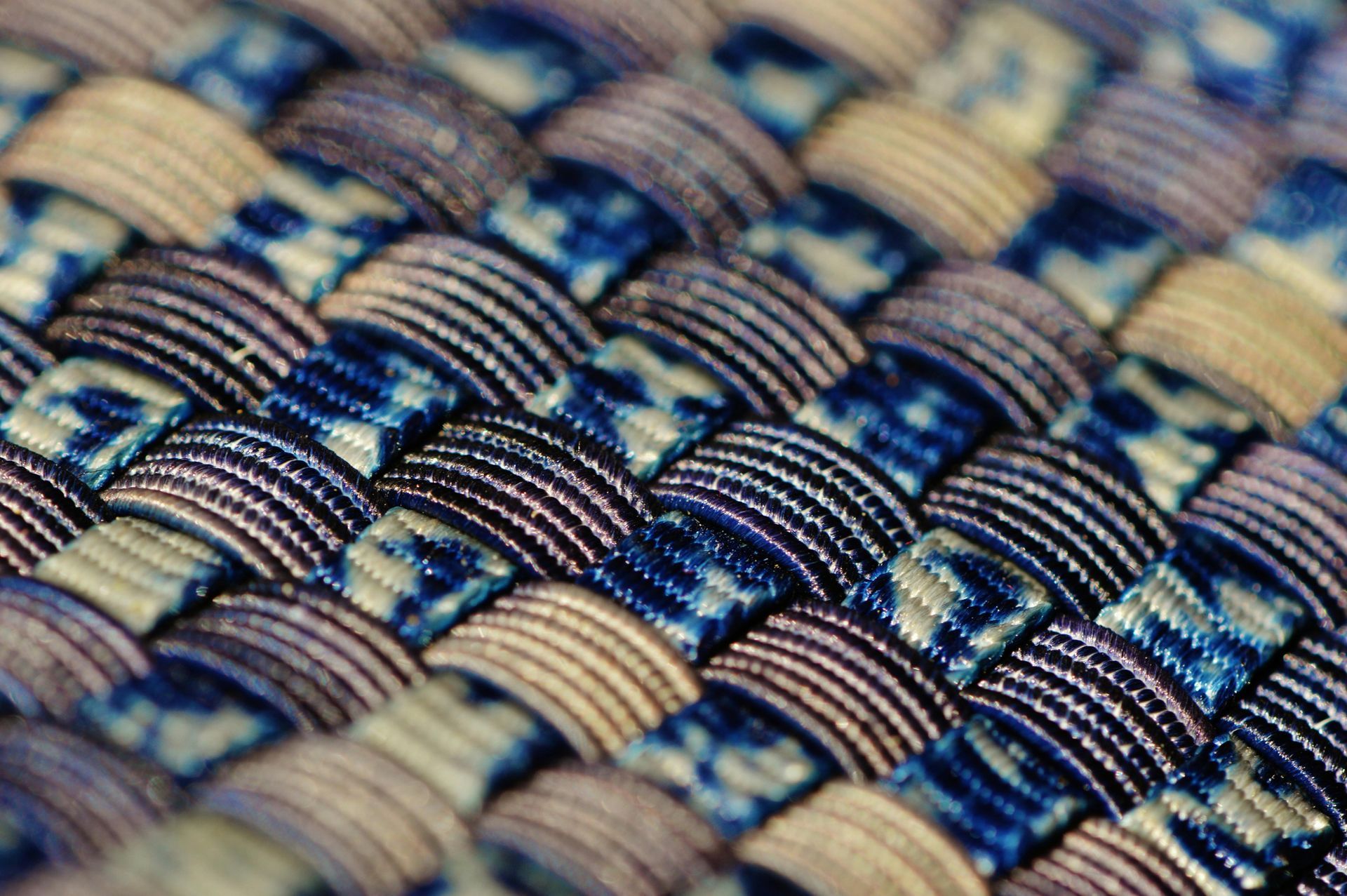 A close up of a blue and white woven fabric