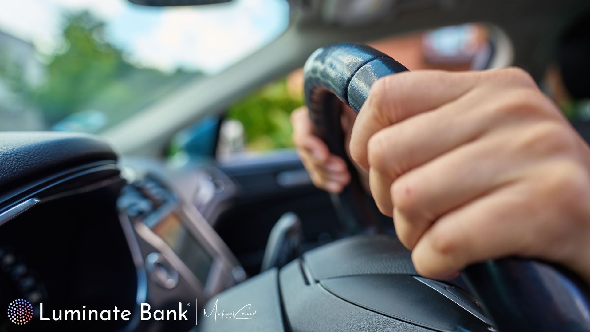 Gripping the steering wheel tightly as an analogy to being in control. 