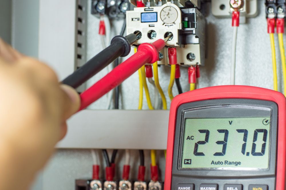 Multimeter Measuring 237v Ac on an Electrical Panel — Industry Fire Services in Atherton Tablelands, QLD