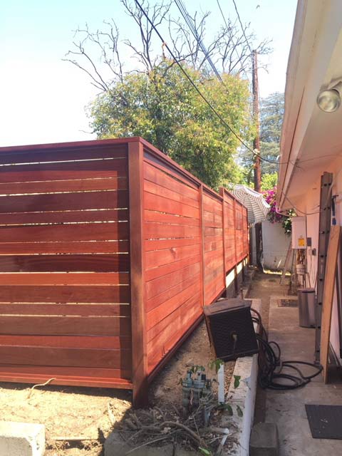 Red Wooden Fence — Repairs and Maintenance in Glendale, CA