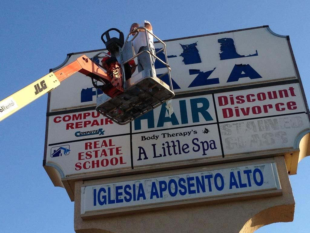 A sign for a little spa and a discount divorce