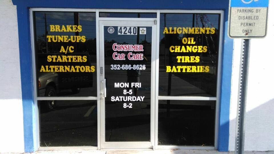 A store front with a sign that says brakes tune-ups a/c starters alternators oil changes tires batteries