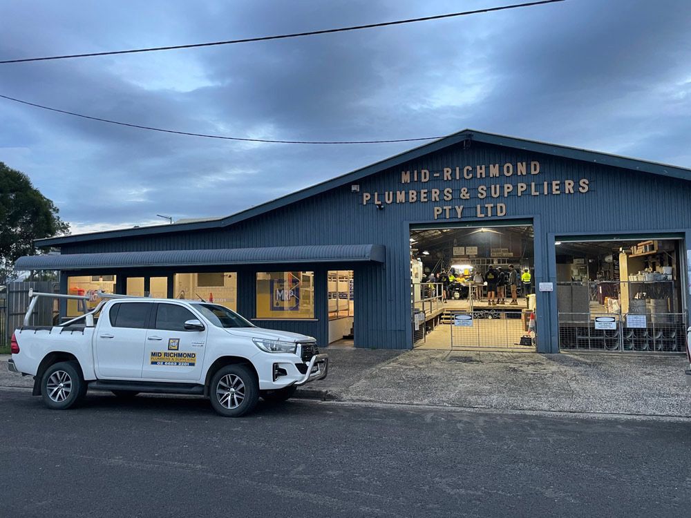 White Truck Parked in Front of a Building — Mid Richmond Plumbers & Suppliers in Coraki, NSW