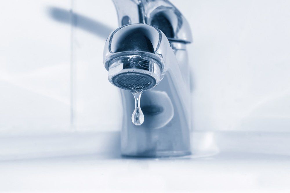 Faucet With Water Drop Close Up — Mid Richmond Plumbers & Suppliers in Coraki, NSW