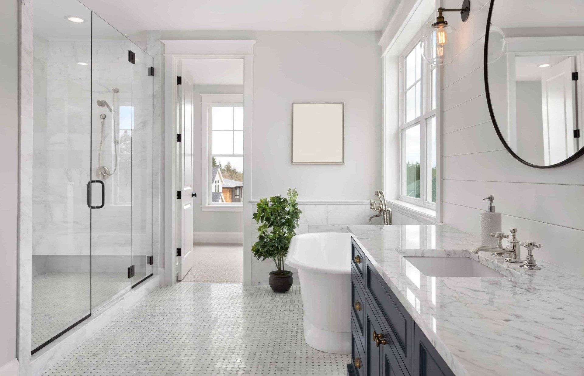 A Bathroom With a Tub, Sink, Mirror and Shower — Mid Richmond Plumbers & Suppliers in Coraki, NSW