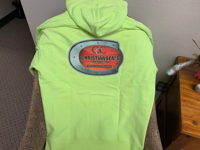 A neon green hoodie with christiansen 's written on the back