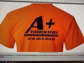 A t-shirt with the word trucking on it