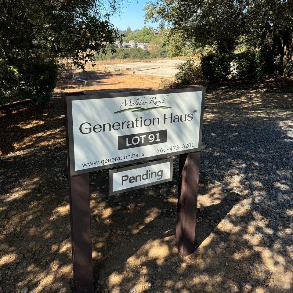 Lot 91 -Central location sits centered on site, two-story with elevator, 
square lot, natural landscaping.