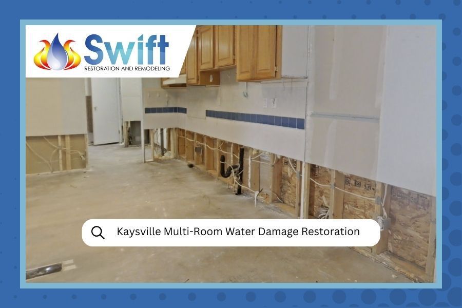 Kitchen damaged by water with exposed walls, cabinets, and plumbing. Swift logo overlayed.
