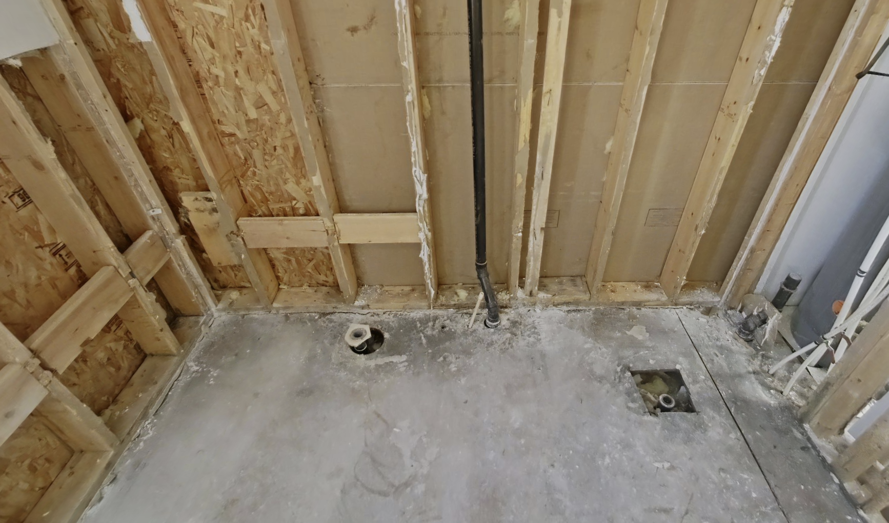 Bathroom drywall removal during restoration