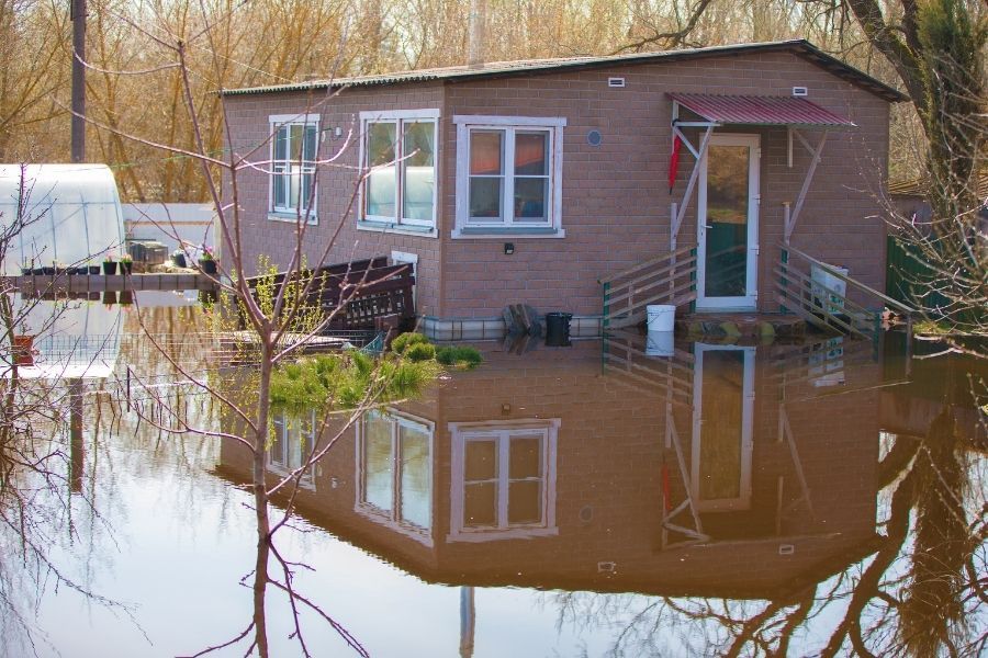 Storm flooding damage in residential area showing water accumulation