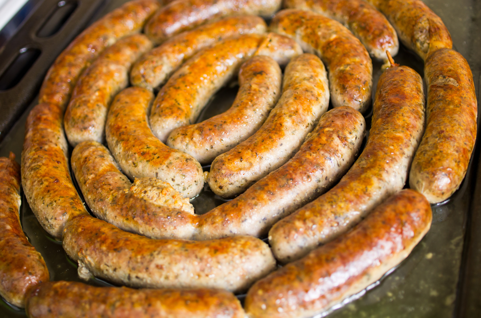 Cooked sausages in a pan