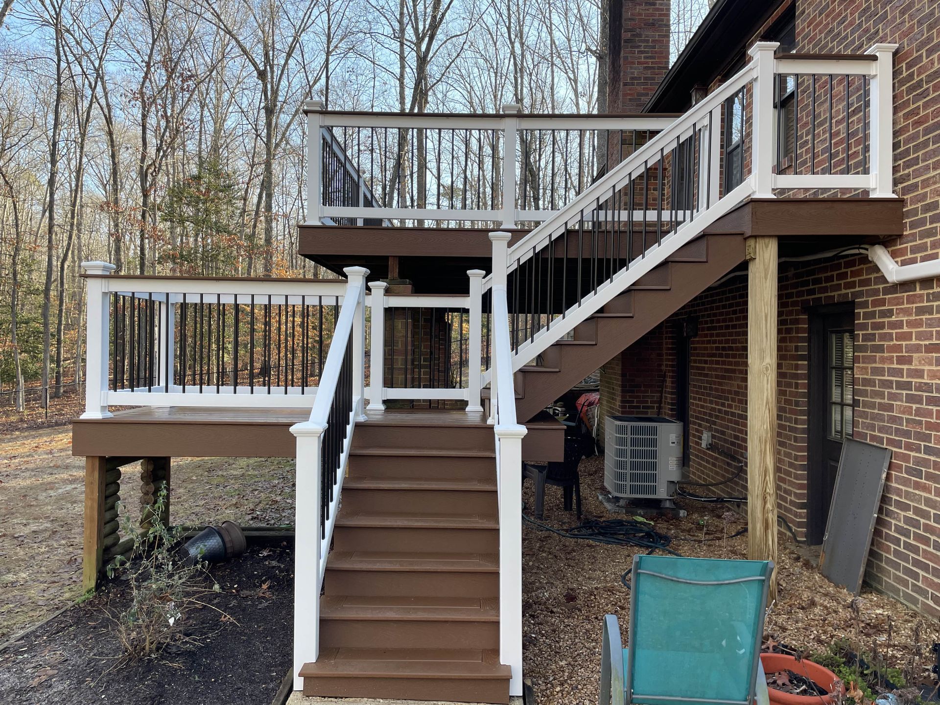 There is a deck with stairs leading up to it.