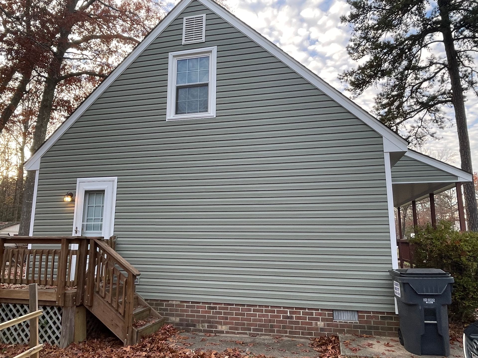 A house with a large n on the top of it